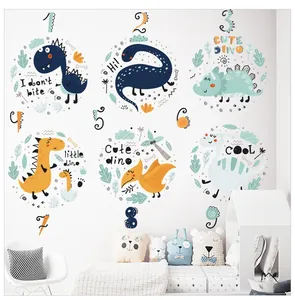 Detail of colorful cartoon dinosaurs and number stickers on a cozy kids room wall