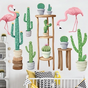 Nordic wall decals featuring pink flamingos and cactus plants in a cozy nursery bedroom