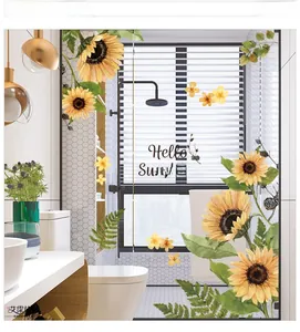 Detail of Hello Sunshine sunflower decals on a modern bathroom glass shower door
