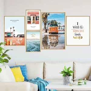 Five-piece framed wall art set featuring summer ocean scenery and a vintage bus on a white wall