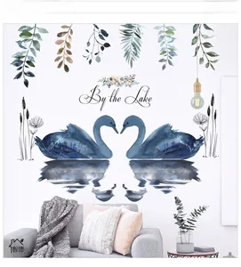 Detailed watercolor wall sticker featuring blue swans and By the Lake artistic lettering