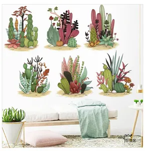 Detail view of colorful watercolor cactus and succulent wall stickers on a white wall