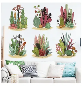 Detail of hand-painted succulent wall stickers above a sofa in a modern interior setting