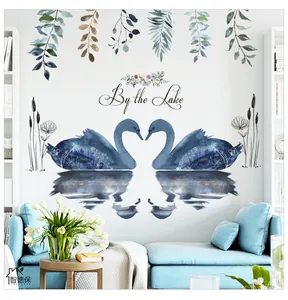 Detail of By the Lake wall stickers featuring blue heart swans and watercolor leaves