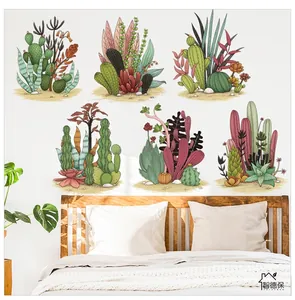 Close-up of watercolor succulent and cactus wall stickers on a minimalist bedroom wall