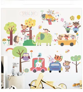 Detail of cute forest animal wall stickers with elephant and lion in a nursery room
