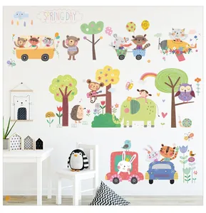 Nursery wall stickers with yellow school bus, cute forest animals, and rainbow scene