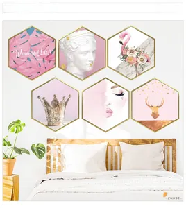 Detail view of hexagonal wall art set featuring pink flamingo and nordic floral motifs