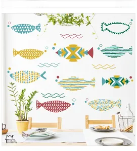 Vibrant fish wall decals with geometric patterns in a modern kitchen dining setting