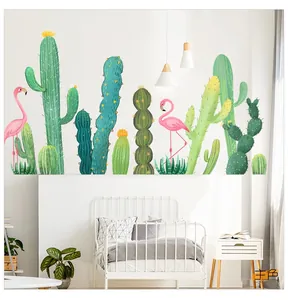 Détail de stickers muraux cactus tropicaux et flamants roses dans une chambre fraîche