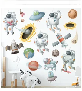 Detailed wall sticker set featuring cartoon astronauts, planets, and UFOs for kids' rooms