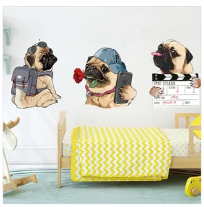 Three cartoon Pug dog wall stickers in travel, romantic and director themes on a white wall