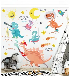 Detailed view of colorful cartoon dinosaur wall stickers on a cozy nursery room wall