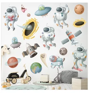Macro detail of hand-drawn astronaut wall decals in a cozy children room setting