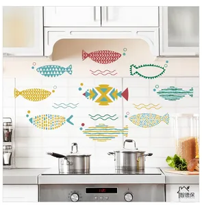 Waterproof kitchen wall stickers featuring hand-painted colorful fish on tile surface