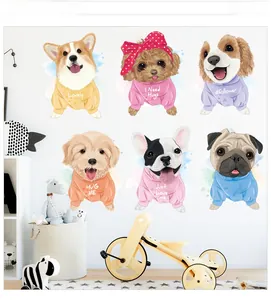 Detail of cute watercolor puppy wall decals featuring Corgi and Golden Retriever on nursery wall