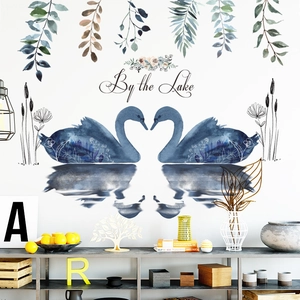 Minimalist watercolor swan lake wall decal with By the Lake text for living room decor