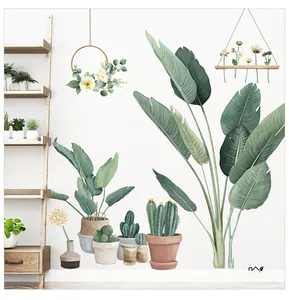 Vue détaillée des stickers muraux avec motifs de fleurs de paradis et de cactus verts