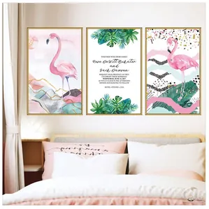 Modern Nordic wall art set featuring pink flamingos and tropical monstera leaves on a wall