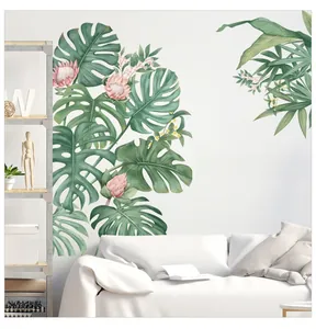 Detail of Nordic monstera wall sticker with tropical leaves on white living room wall