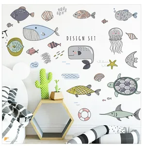Detailed view of hand-drawn marine animal wall stickers featuring whales and sea turtles