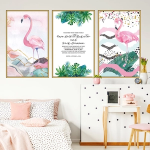 Three-piece flamingo art set with gold frames in a modern minimalist bedroom setting
