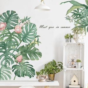 Nordic monstera leaf wall decal with pink protea flowers and tropical green foliage