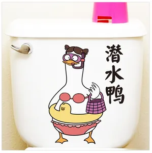 Waterproof diving duck sticker applied to a white ceramic toilet water tank surface
