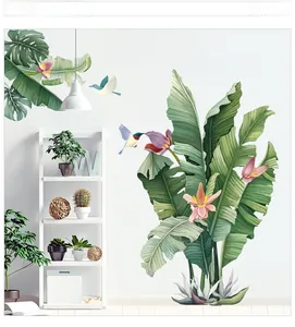 Detail of waterproof plantain leaf wall decals with hummingbird and flower accents