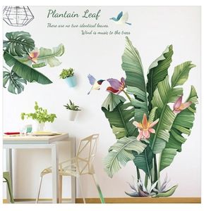 Detail of waterproof plantain leaf wall decals with birds and quote in a dining room