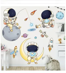 Detailed view of astronaut wall decals with planets and rocket for kids bedroom