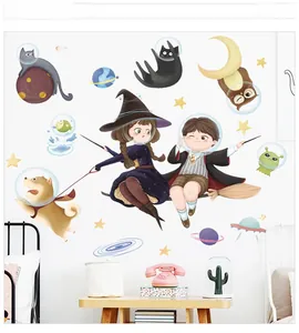 Detail of space magic wall stickers with cartoon witch and stars in a kids bedroom