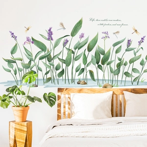 Nature wall sticker featuring green leaves, dragonflies and flowers for bedroom decor