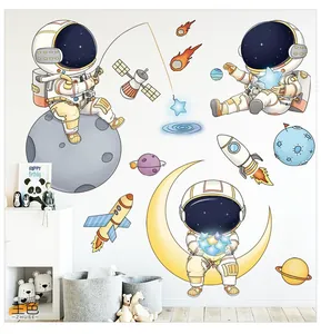 Close-up of cute astronaut wall stickers with moon and stars for a kids bedroom decoration
