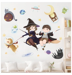 Detail of magic wizard wall stickers with children and space animals on a white wall