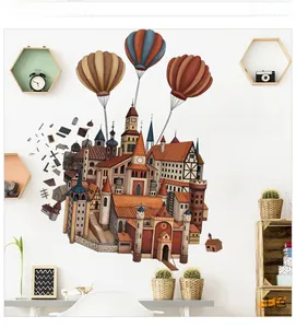 Detail of hot air balloon castle wall sticker featuring Castle in the Sky text on white wall