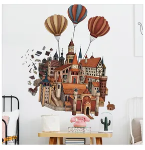 Detail of Castle in the Sky wall sticker with hot air balloons in a cozy Nordic nursery