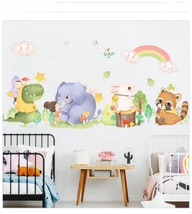 Detail view of colorful animal wall stickers featuring an elephant and rainbow in child bedroom