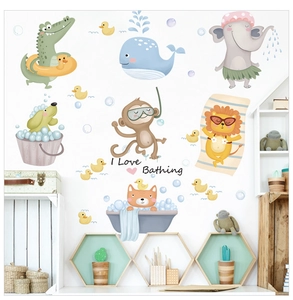 Detail of waterproof cartoon animal wall stickers featuring a blue whale and baby elephant