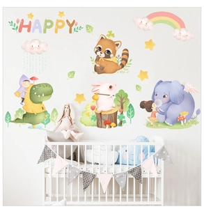 Close-up of cute elephant and animal wall decals in a white nursery room setting