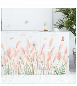 Detail showing pink reed and white dandelion wall stickers with butterfly accents