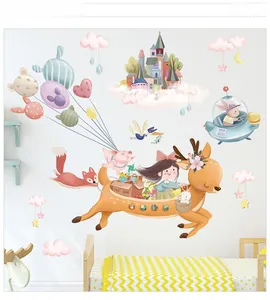 Detail of fairytale wall decals featuring a girl on a deer with colorful balloons