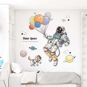 Cartoon astronaut and space planets wall decals for creative children bedroom decor
