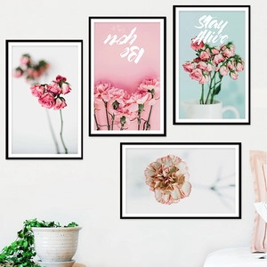 Modern set of four pink floral wall art frames with motivational quotes for bedroom decor