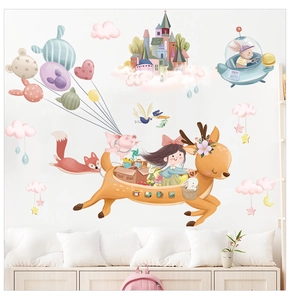 Detail of dreamlike nursery wall decals with deer, air balloons and floating castle