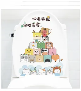 Cartoon animal pyramid PVC sticker showing tigers and pandas on a white toilet lid