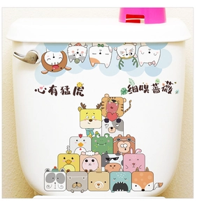 Cartoon tiger and floral decals applied to a white ceramic bathroom toilet tank surface