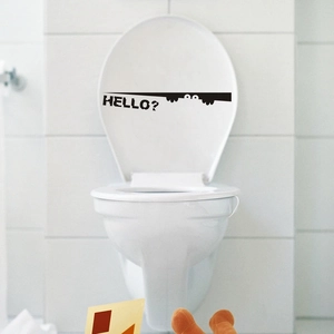 Funny toilet sticker featuring Hello text and peeking eyes on a white bathroom lid