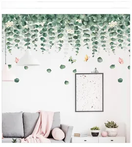 Detailed wall sticker showing hanging eucalyptus leaves with colorful butterflies