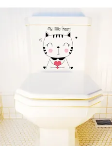 Detail of waterproof cat toilet sticker with 'my little heart' text on white ceramic tank